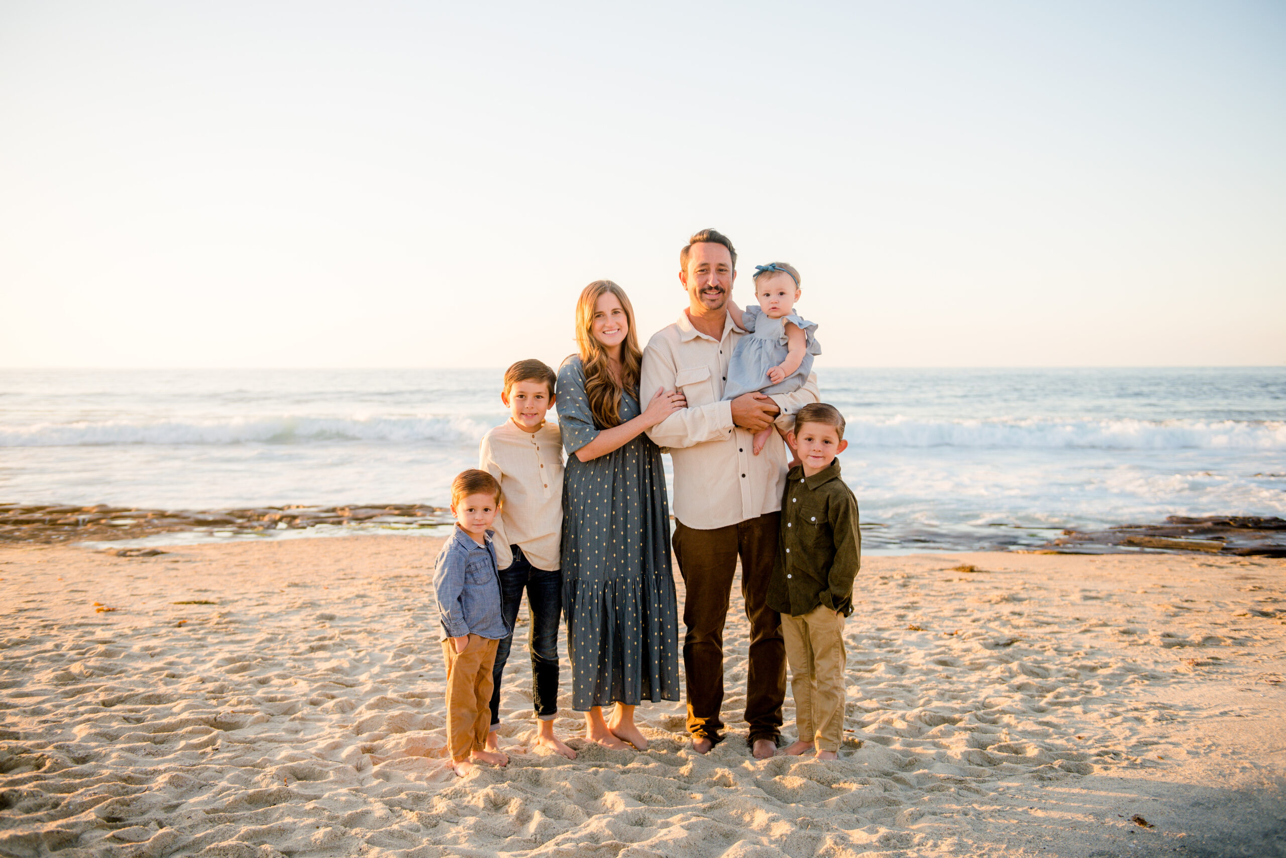happy family in san diego being photographed by mattie taylor photography